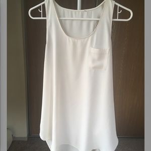 Loft ivory-cream high low racerback tank.